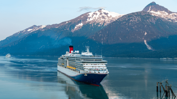 Cruise ship with mountains in the back