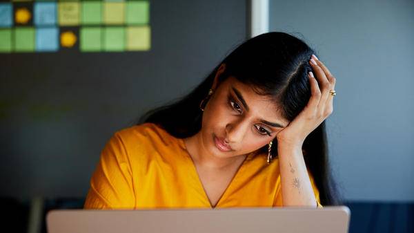 Woman at work stressed