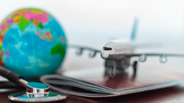 A aeroplane model on top of a passport