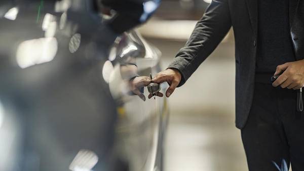Businessman with car