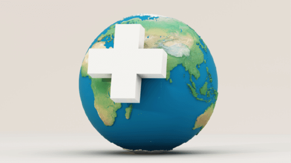 Globe with a medical cross ontop