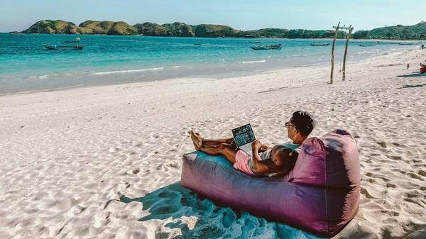 Remote working on beach