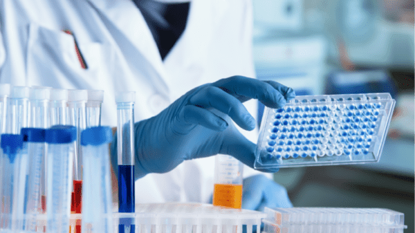 Scientist looking at medicine