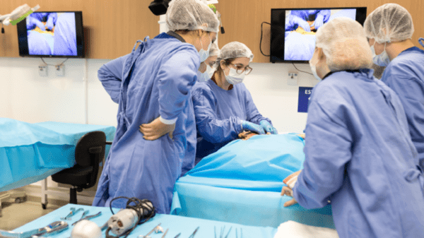 Doctors looking at a body