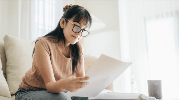 Woman looking at papers