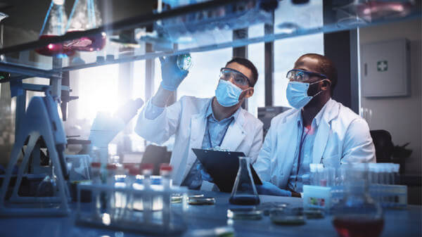 Doctors looking in a lab