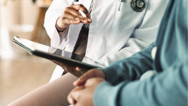 Doctor and patient talking