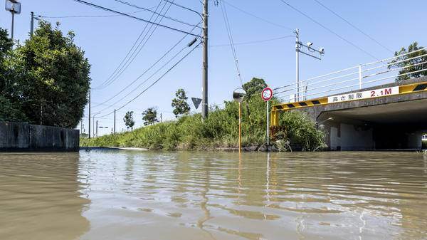 Japan floods strand thousands as record rain disrupts Tokyo transport
